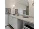 Elegant bathroom features a marble countertop vanity, stylish mirror, and modern fixtures at 170 Boulevard Se # H428, Atlanta, GA 30312
