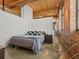 Modern bedroom with wood ceiling, exposed brick, and walk in closet at 170 Boulevard Se # H428, Atlanta, GA 30312