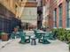 Cozy courtyard with rocking chairs and landscaping nestled between brick walls at 170 Boulevard Se # H428, Atlanta, GA 30312