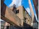 Close-up of brick building exterior with skyway and old industrial features at 170 Boulevard Se # H428, Atlanta, GA 30312