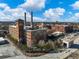 An expansive exterior view of the historic brick building with unique architectural details at 170 Boulevard Se # H428, Atlanta, GA 30312