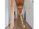 Long hallway with wooden pillars and ceiling beams offering a unique architectural style at 170 Boulevard Se # H428, Atlanta, GA 30312