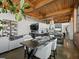 Open-concept living space featuring kitchen, dining, and living area with exposed ductwork and brick at 170 Boulevard Se # H428, Atlanta, GA 30312