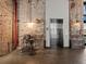 Lobby area with brick walls, concrete floors, elevator access and industrial details provides a unique space at 170 Boulevard Se # H428, Atlanta, GA 30312