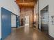 Lobby area with brick walls, concrete floors, elevator access and industrial details provides a unique space at 170 Boulevard Se # H428, Atlanta, GA 30312