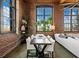 Open dining space blends modern decor with exposed brick and natural light through large windows at 170 Boulevard Se # H428, Atlanta, GA 30312