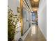 Bright hallway with polished concrete floors and modern artwork leading into a spacious living area at 170 Boulevard Se # H428, Atlanta, GA 30312