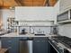 Modern kitchen featuring stainless steel appliances, white countertops, and sleek cabinetry at 170 Boulevard Se # H428, Atlanta, GA 30312
