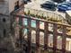 View of the outdoor pool area in the historic building featuring sun loungers and well-maintained brickwork at 170 Boulevard Se # H428, Atlanta, GA 30312