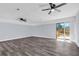 Spacious bonus room with sliding glass doors leading to a deck and contemporary flooring at 2917 Mcafee Rd, Decatur, GA 30032