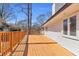 Expansive wood deck perfect for outdoor entertaining on a sunny day at 2917 Mcafee Rd, Decatur, GA 30032