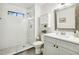 Bright bathroom with a walk-in shower and stylish white vanity at 4184 Westchester Ne Trce, Roswell, GA 30075