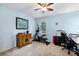 Bedroom featuring a window, exercise machine, and desk at 4184 Westchester Ne Trce, Roswell, GA 30075