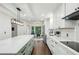 Bright kitchen with stainless steel appliances, lots of counter space, and an island with seating at 4184 Westchester Ne Trce, Roswell, GA 30075