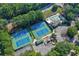 Aerial view of the community tennis and basketball courts and pool at 4184 Westchester Ne Trce, Roswell, GA 30075