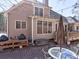 Charming backyard patio with outdoor seating and cooking area, ideal for entertaining and enjoying the outdoors at 112 Estates At The Lake Dr, Canton, GA 30114