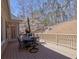 Relax on this wooden deck with outdoor seating, a grill and wooded views at 112 Estates At The Lake Dr, Canton, GA 30114