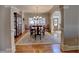 Elegant dining room with decorative rug, wainscoting, and chandelier at 112 Estates At The Lake Dr, Canton, GA 30114