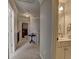 Hallway with views to other rooms, including a bathroom with vanity and sink at 112 Estates At The Lake Dr, Canton, GA 30114