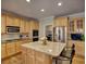 Spacious kitchen featuring a center island, granite countertops, and stainless steel appliances at 112 Estates At The Lake Dr, Canton, GA 30114
