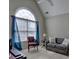 Living area showcasing a large window, comfortable seating, and natural light at 112 Estates At The Lake Dr, Canton, GA 30114