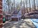 Pool house and covered pool, creating a refreshing retreat for relaxation and recreation at 112 Estates At The Lake Dr, Canton, GA 30114