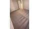 Neutral bedroom showcasing plush carpeting and two closets with white doors at 116 Deer Xing, Temple, GA 30179