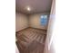 Bedroom with plush carpet, white walls, and a window with natural light at 116 Deer Xing, Temple, GA 30179