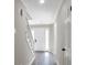 Sunlit hallway with updated lighting and new flooring at 4620 Central Dr, Stone Mountain, GA 30083