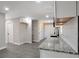 Contemporary kitchen featuring a white backsplash, stainless steel appliances, and granite countertops at 4620 Central Dr, Stone Mountain, GA 30083