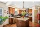 Bright kitchen features stainless appliances, granite counters, and stylish dark backsplash at 5156 Olive Branch Cir, Powder Springs, GA 30127