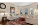 Cozy living room with neutral tones, plush seating, and a decorative rug at 5156 Olive Branch Cir, Powder Springs, GA 30127