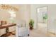 Sitting area featuring neutral walls, carpet floors, and a comfortable armchair at 5156 Olive Branch Cir, Powder Springs, GA 30127