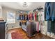 Walk-in closet with custom shelving and lots of storage space for clothes and accessories at , Tucker, GA 30084