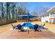 Charming pool area featuring a sunny deck, comfortable lounge chairs, and privacy at 3515 Montreal Way, Tucker, GA 30084