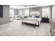 Serene main bedroom featuring neutral tones, elegant furnishings, and plenty of natural light at , Locust Grove, GA 30248
