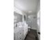 Bright bathroom featuring a glass shower and modern white vanity at 1000 Bozeman Dr, Atlanta, GA 30341