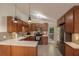 Modern kitchen with stainless steel appliances, beautiful wood cabinets and a quartz countertop at 1000 Bozeman Dr, Atlanta, GA 30341
