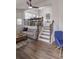 Cozy living room with modern furniture, staircase and hardwood floors at 1000 Bozeman Dr, Atlanta, GA 30341