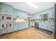 Spacious kitchen with updated stainless steel appliances, and light blue cabinetry at 2086 Mountain Creek Ct, Stone Mountain, GA 30087