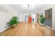 Spacious living room with hardwood floors, natural light, and open access to other rooms at 2086 Mountain Creek Ct, Stone Mountain, GA 30087
