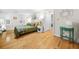 Cozy bedroom with hardwood floors, neutral paint, and bright windows at 2086 Mountain Creek Ct, Stone Mountain, GA 30087