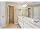 Bathroom with double sinks and ample counter space in this well-lit space at 501 Barhams Ridge Dr, Mcdonough, GA 30252