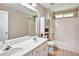 Bathroom features double vanity, shower and tub combo with tile flooring at 501 Barhams Ridge Dr, Mcdonough, GA 30252