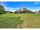 This home features a gorgeous, well-maintained lawn and mature trees at 501 Barhams Ridge Dr, Mcdonough, GA 30252