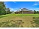 This home features a gorgeous, well-maintained lawn and mature trees at 501 Barhams Ridge Dr, Mcdonough, GA 30252
