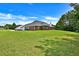 A great shot of the exterior of this home and its luscious, well-maintained lawn at 501 Barhams Ridge Dr, Mcdonough, GA 30252
