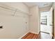 A useful utility room with hardwood style floors and plenty of room to store items at 501 Barhams Ridge Dr, Mcdonough, GA 30252