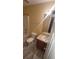 Full bathroom featuring a vanity, toilet, and tub with a shower at 1956 Cutters Mill Way, Lithonia, GA 30058