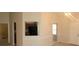 View of the dining room and kitchen featuring open floor plan and modern lighting at 1956 Cutters Mill Way, Lithonia, GA 30058